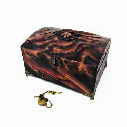 wood and black leather dragon eye treasure chest in shades of bronze and red